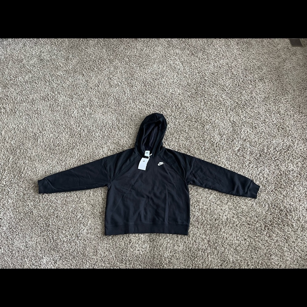 Women’s Nike sweatshirt. Black. Never worn.